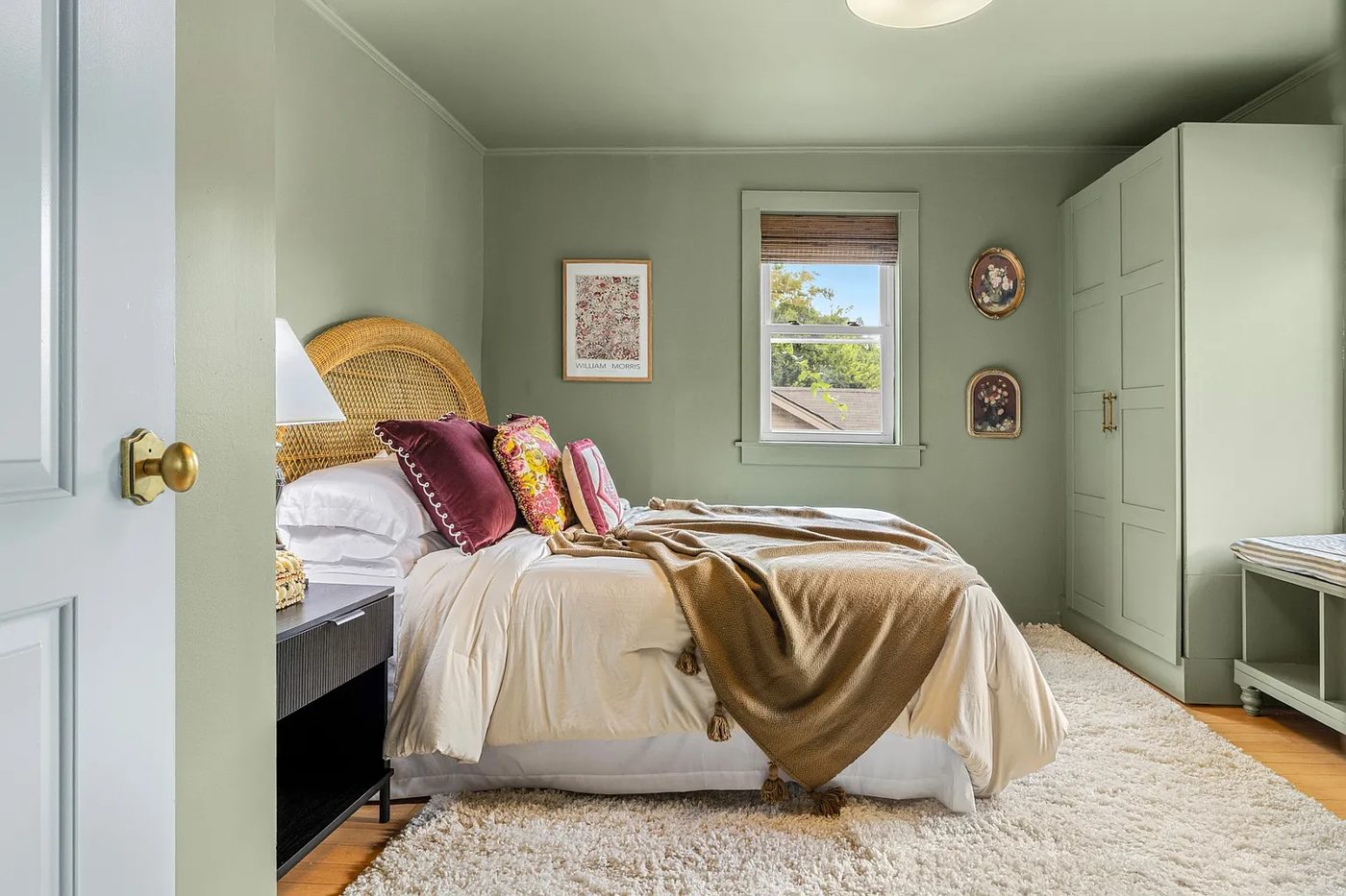 Bedroom remodel with painted walls, ceiling, and built-ins