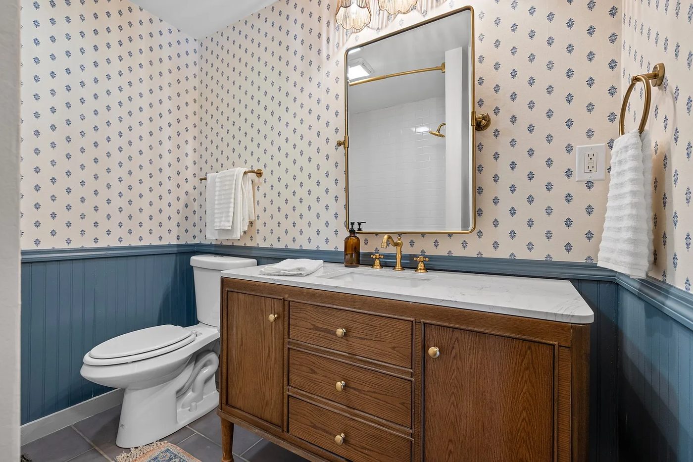 Bathroom remodel with new vanity and painted wainscoting