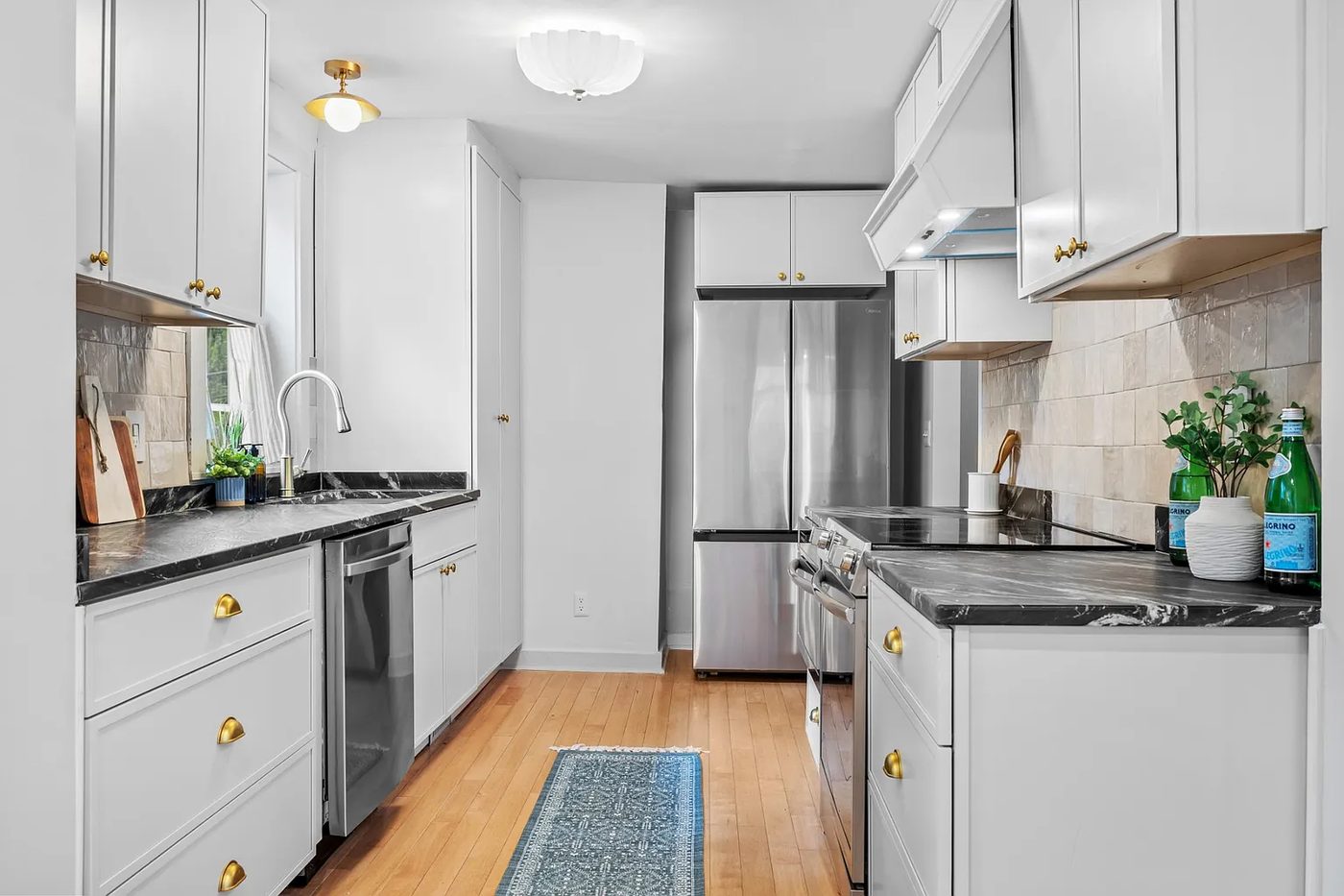 Kitchen remodel with painted cabinets and new hardware